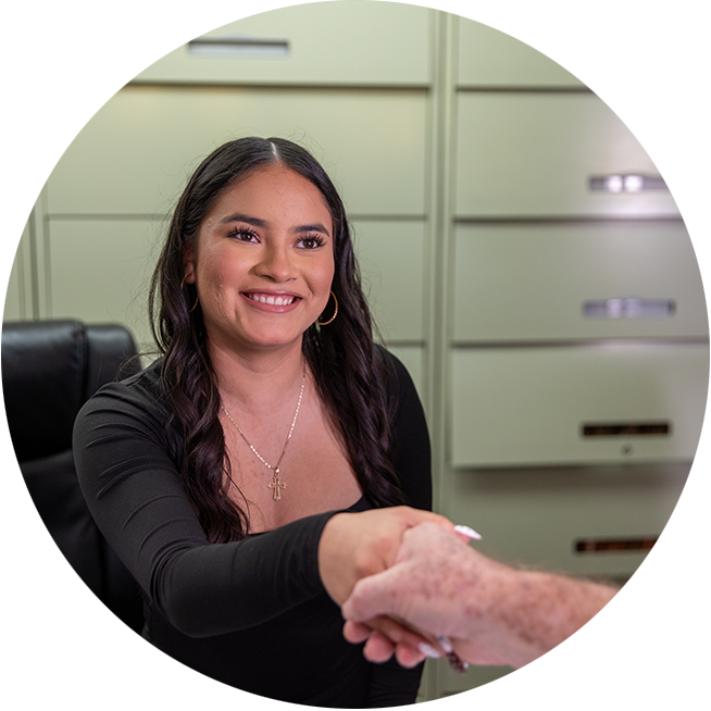 team member shaking patients hand